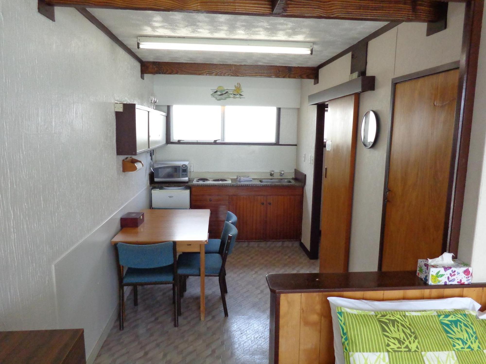 קופרס ביץ' San Marino Motor Lodge Absolute Beachfront חדר תמונה